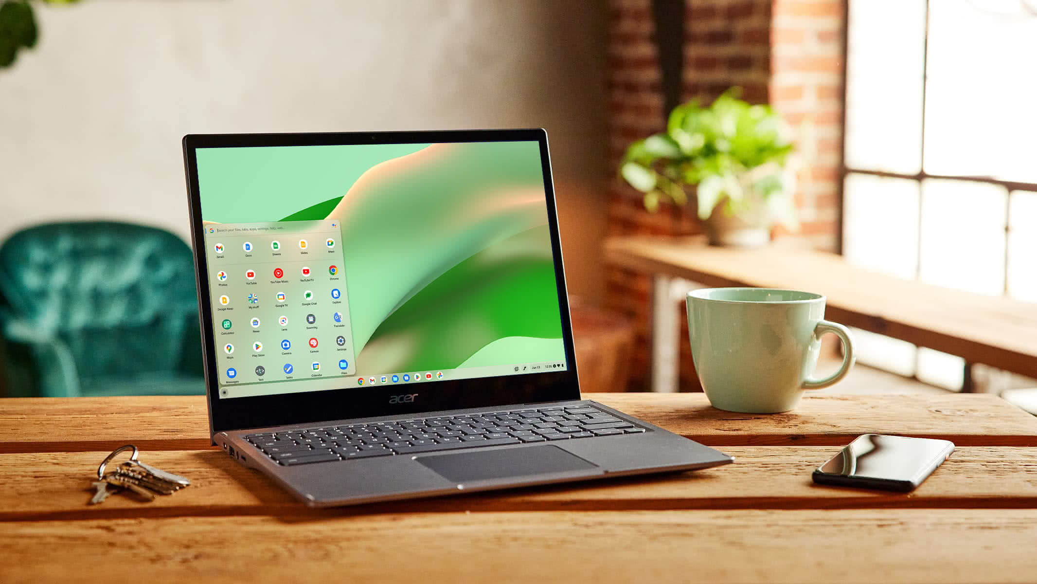 A person interacting with the touchscreen of a convertible Chromebook in a cafe.